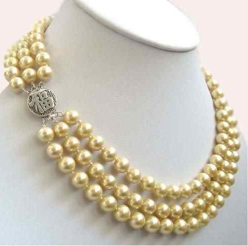 Wholesale-Wholesale-Beautiful-18-10-11mm-south-sea-natural-gold-pearl-necklace-14K[1].jpg