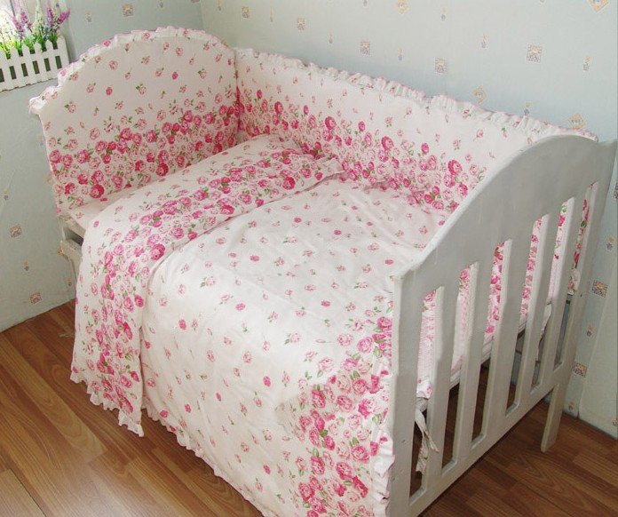 Wood With Flowers Images On Rectangular Shape Baby Bed